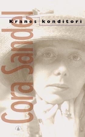 "Kranes konditori - interiør med figurer" av Cora Sandel