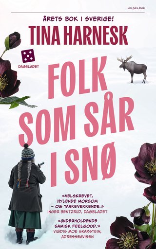 Folk som sår i snø